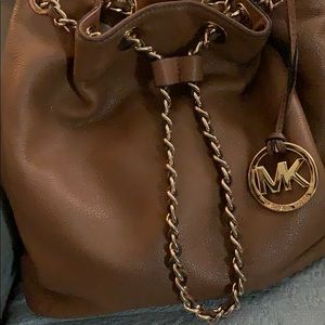 MK purse NWOT saddle or caramel color